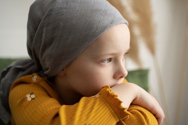 Young child in therapy for battling cancer