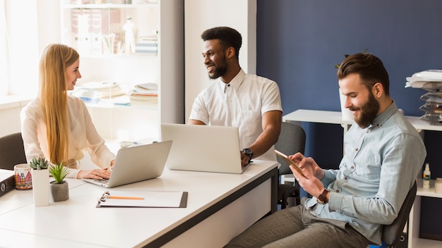 Young colleagues in office