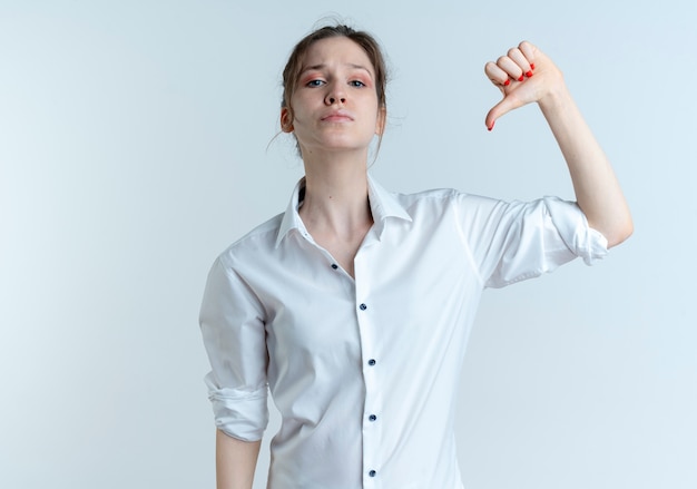 Free photo young confident blonde russian girl points at herself isolated on white space with copy space