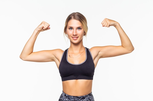 Young cool woman strong gesture show biceps isolated on white