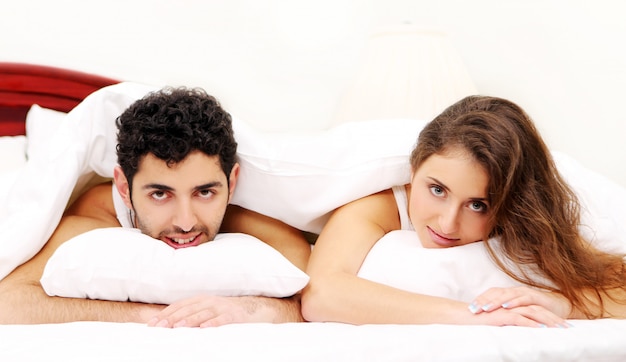 Young couple in bed