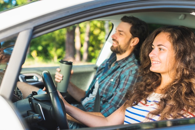 Young couple on a car trip