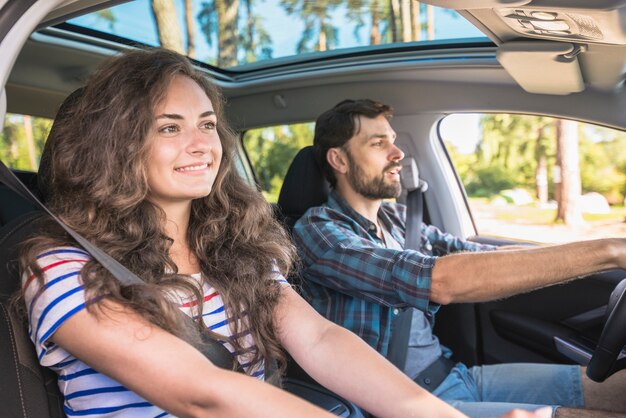 Young couple on a car trip