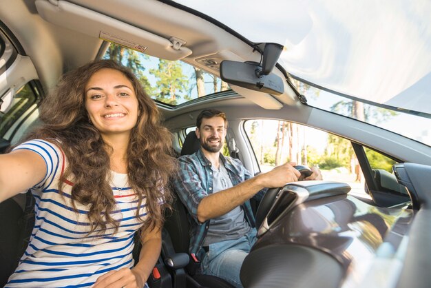 Young couple on a car trip