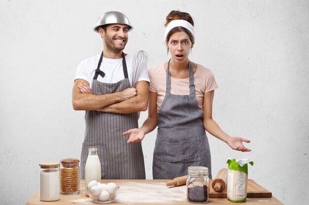 Young couple cooking together