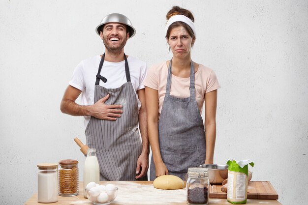 Young couple cooking together