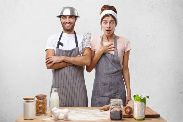 Young couple cooking together