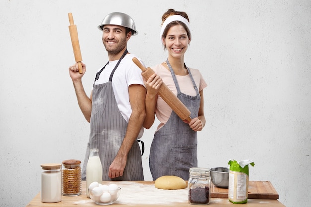 Young couple cooking together