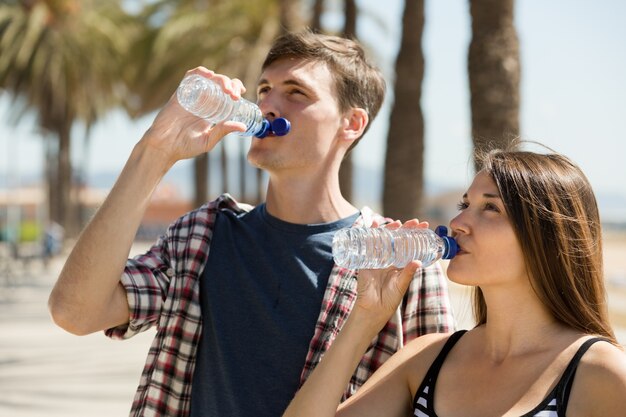 Young couple drink water