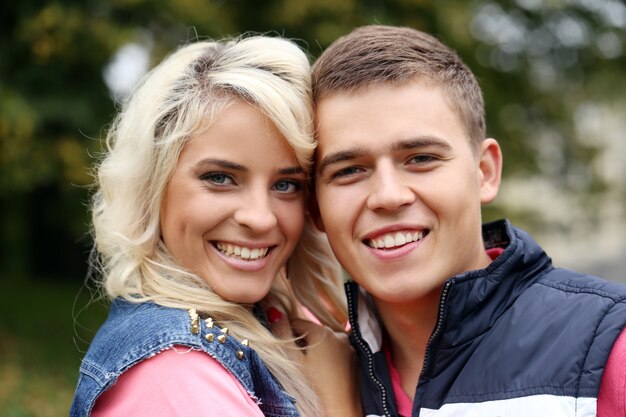 Young couple expressing their feelings at a park