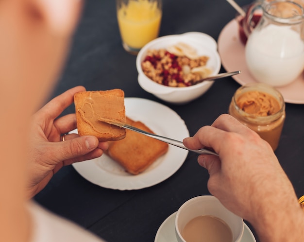 Young couple having breakfast