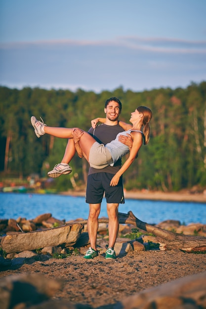 Young couple having fun while training