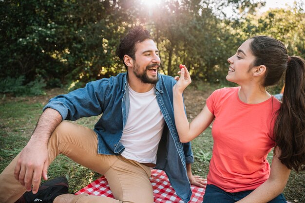 Young couple having a picnic