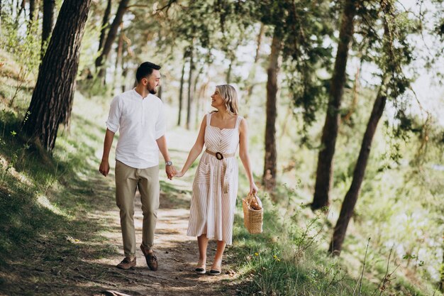 Young couple having a walk in the woods