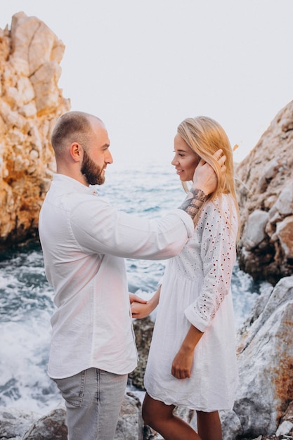 Young couple on honeymoon in Greece by the sea