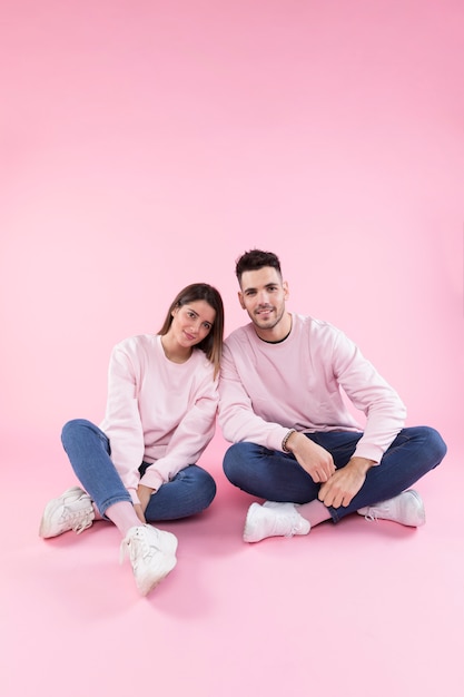 Young couple looking at camera