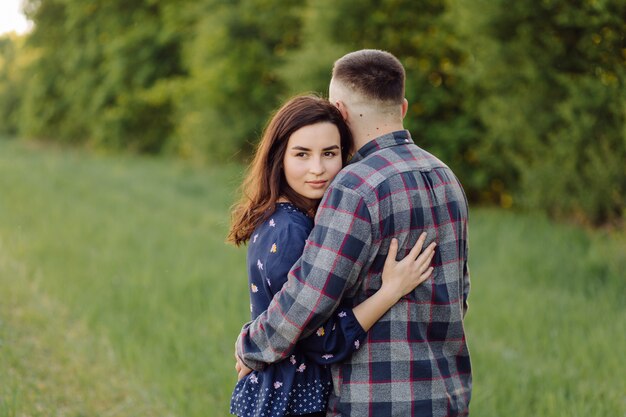 Young couple in love having fun and enjoying the beautiful nature