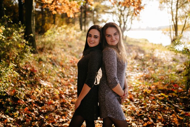 Young couple in love. A love story in the autumn forest park