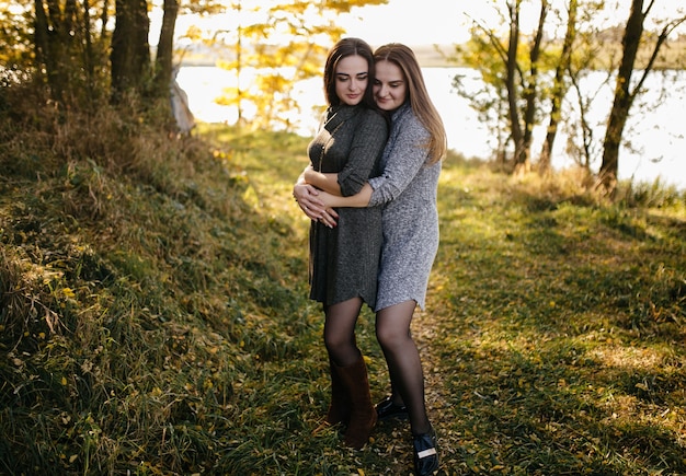 Young couple in love. A love story in the autumn forest park