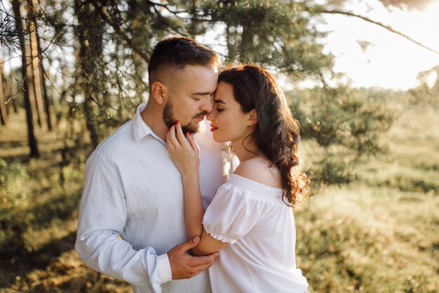 Young couple in love walking in the park