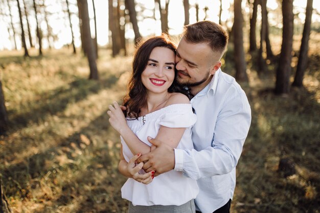 Young couple in love walking in the park