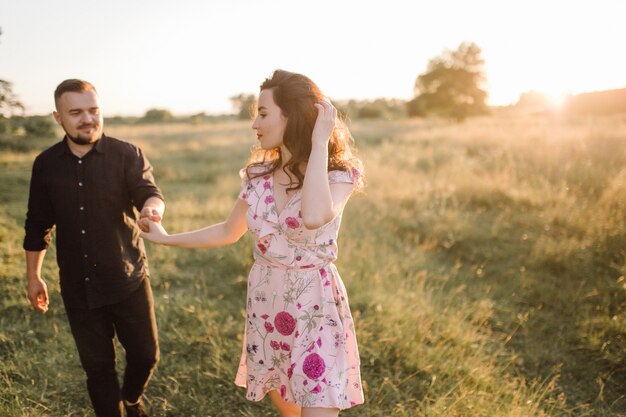 Young couple in love walking in the park