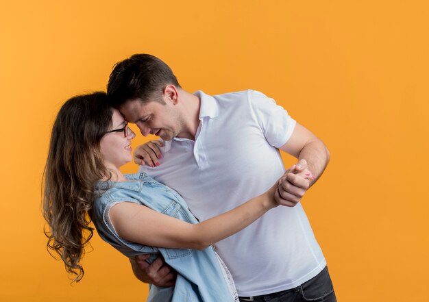 Romantic Couple Love Looking Each Other Embracing Kissing Black Background  Stock Photo by ©Tverdohlib.com 654980232