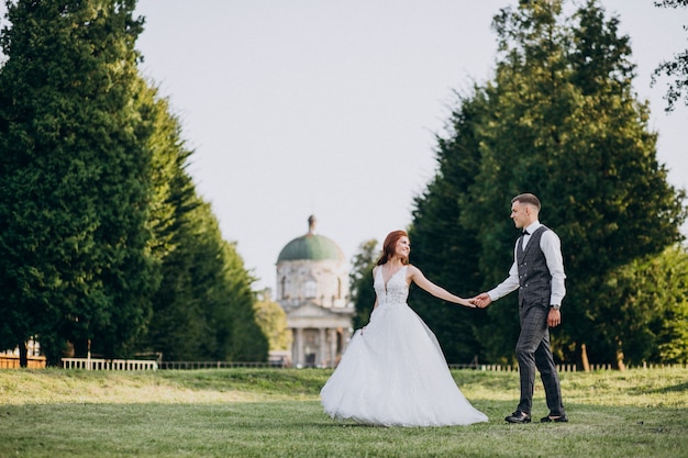 Young couple marriage photo session outside