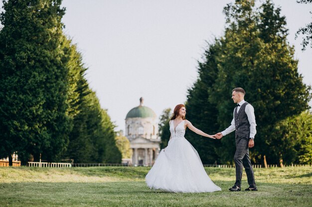 Young couple marriage photo session outside