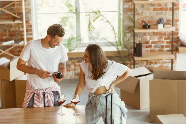 Young couple moved to a new house or apartment.