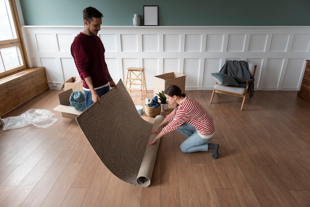 Free photo young couple moving into a new home