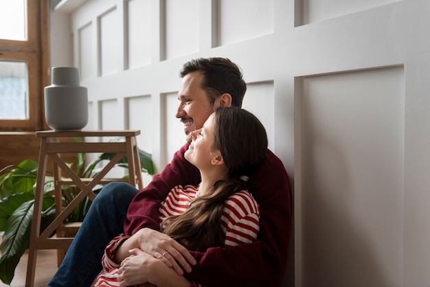 Free photo young couple moving into a new home