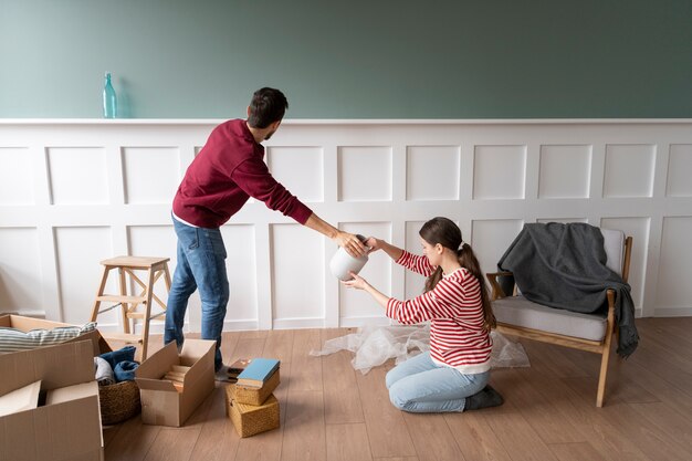 Young couple moving into a new home