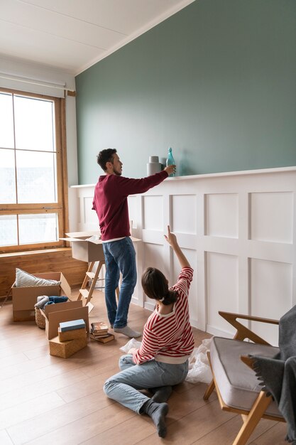 Young couple moving into a new home