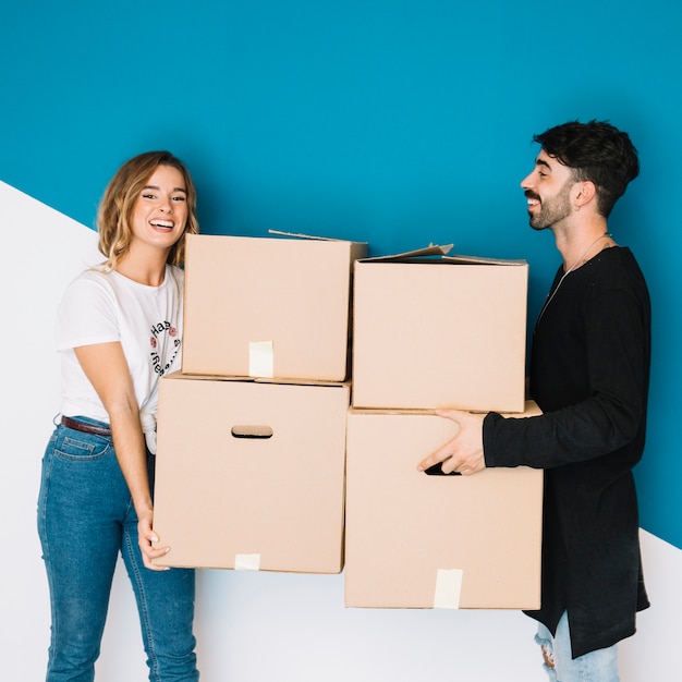 Young couple moving to new flat