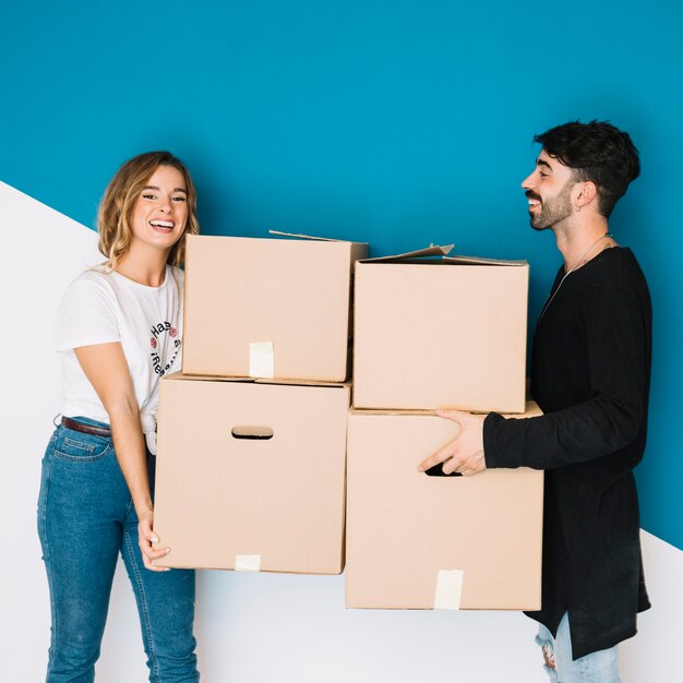 Young couple moving to new flat