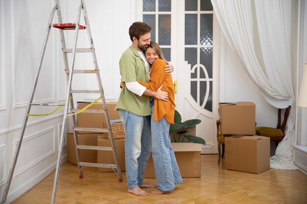 Young couple moving in new home