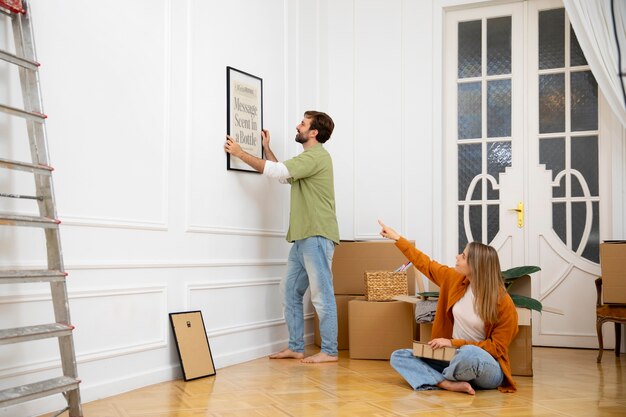 Young couple moving in new home