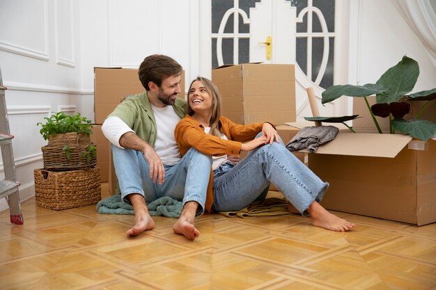 Young couple moving in new home