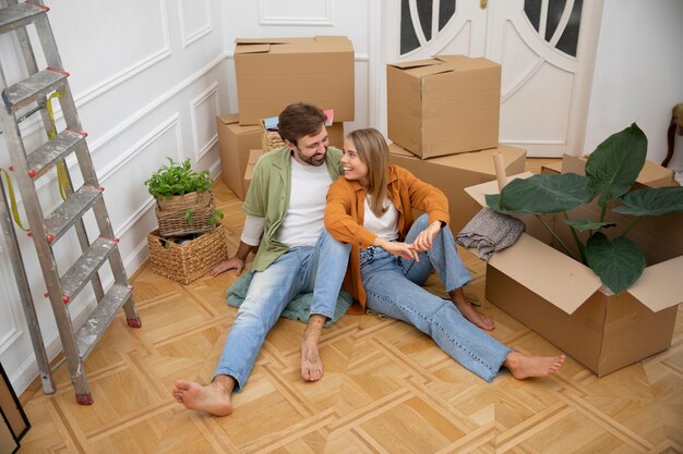 Young couple moving in new home