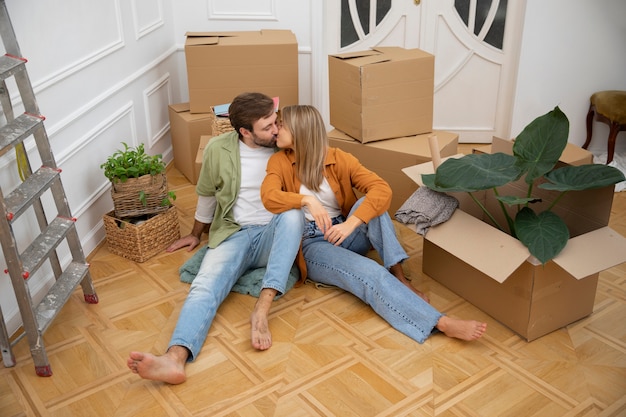 Young couple moving in new home