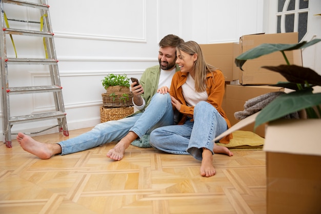 Young couple moving in new home