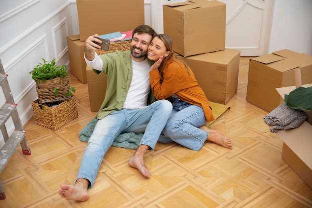 Young couple moving in new home