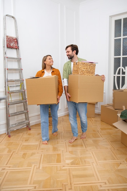 Young couple moving in new home