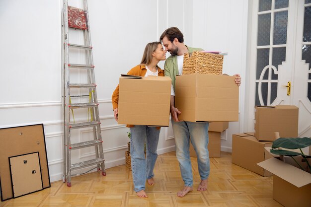 Young couple moving in new home