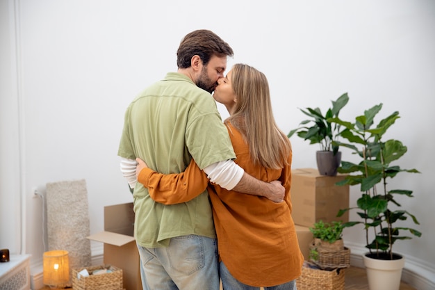 Free photo young couple moving in new home