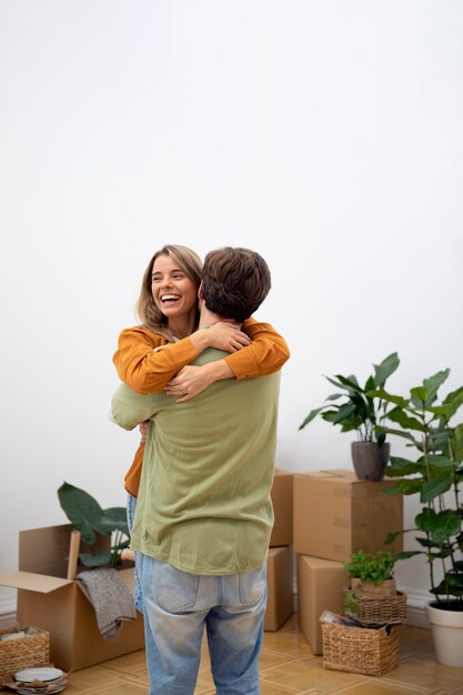 Young couple moving in new home