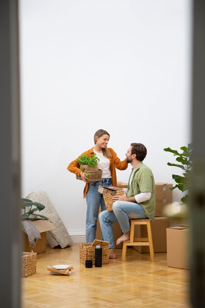 Young couple moving in new home