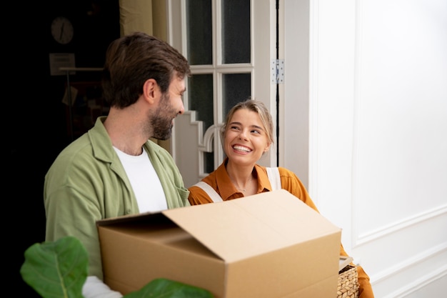 Young couple moving in new home