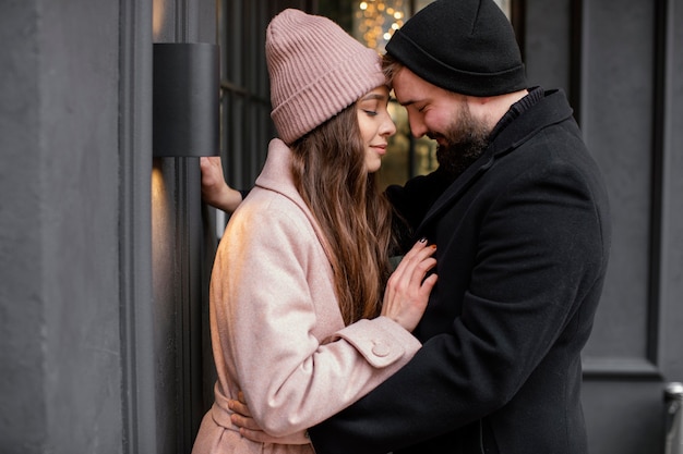 Young couple outdoor hugging